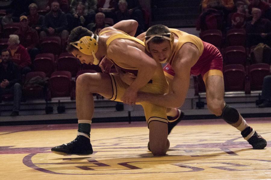 Redshirt+senior+Tanner+Weatherman+wrestles+Central+Michigans+Jordan+Atienza+at+165+lbs.+Weatherman+won+the+match+for+the+cyclones+9-3.+The+Cyclones+and+Chippewas%C2%A0dueled+Jan+31+at+Hilton+Coliseum+in+Ames%2C+IA.%C2%A0