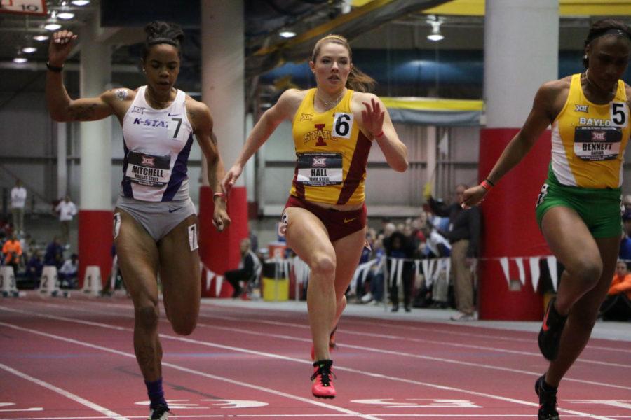 Freshman Kate Hall crosses the finish line during the women's 60-meter finals at the Big 12 Indoor Championships Feb. 27. Hall placed fourth with a time of 7.39 seconds.