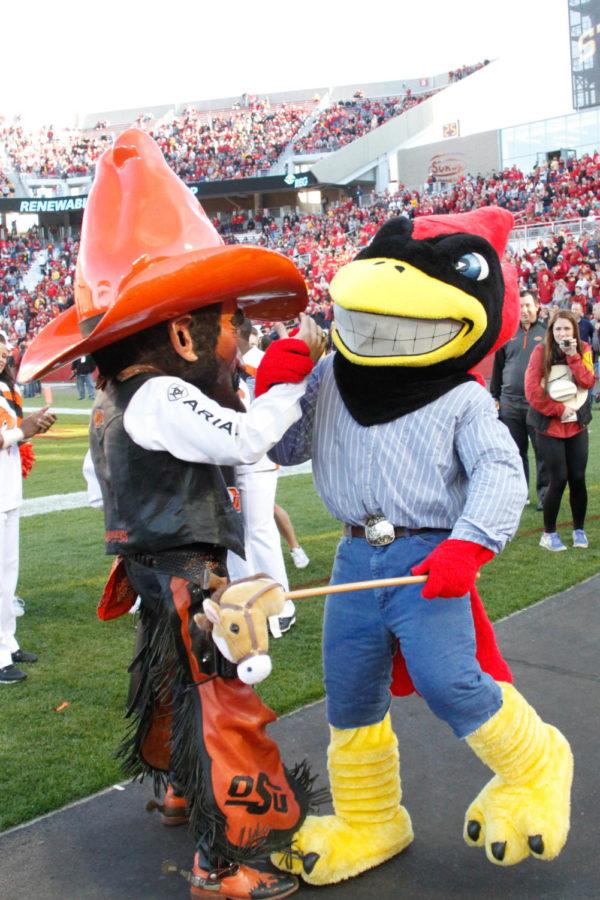 Oklahoma State mascot, Pistol Pete, and Cy mess around during the game against Oklahoma State University on Nov. 14. The Cyclones would go on to lose 31-35.  