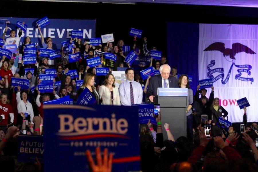 Senator Bernie Sanders with his family backing him speaking at his caucus watch party shortly before the results come in Feb. 1. For much of the night Sanders was 50/50 in the polls with democratic rival Hillary Clinton.
