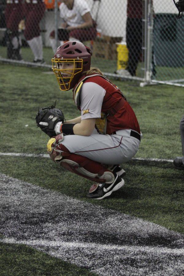 Senior catcher Sammie Hildreth looks at the Iowa State coaches for signals during the game. Hildreth went 0 for 2 with a walk and a run scored in the 7-0 win against IUPUI on Feb. 12. 