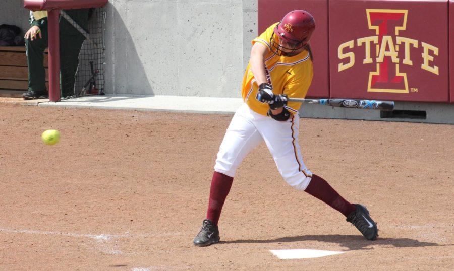 Aly Cappaert hits the ball at the game on sunday may 4 against baylor.