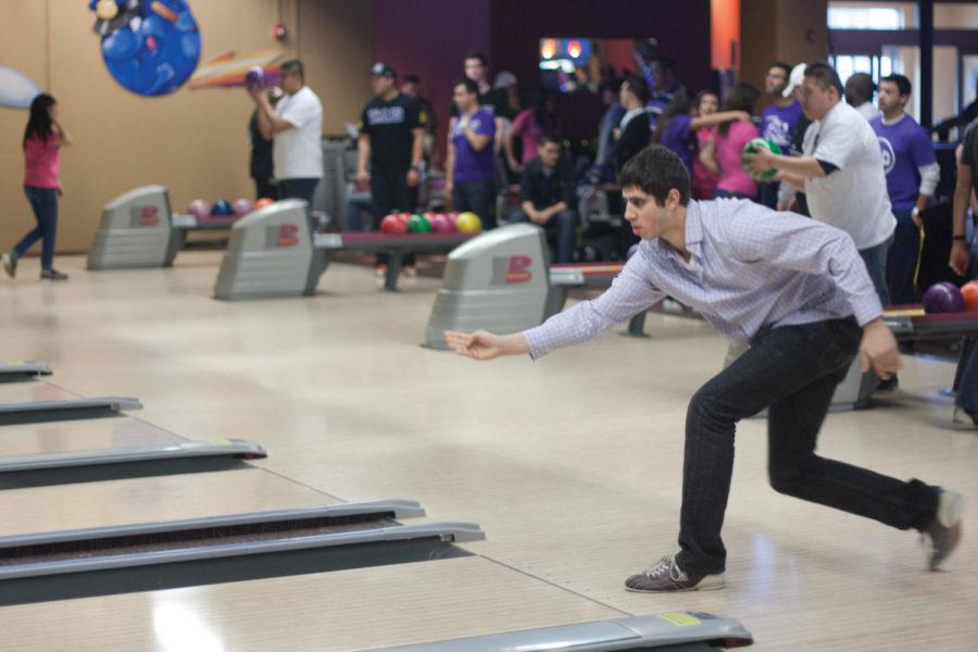 Isaac Garlington, graduate research assistant in mechanical engineering, bowls during the practice round of the Beta-Gamma Charity Bowl on Saturday, March 3, at Perfect Games in west Ames.
