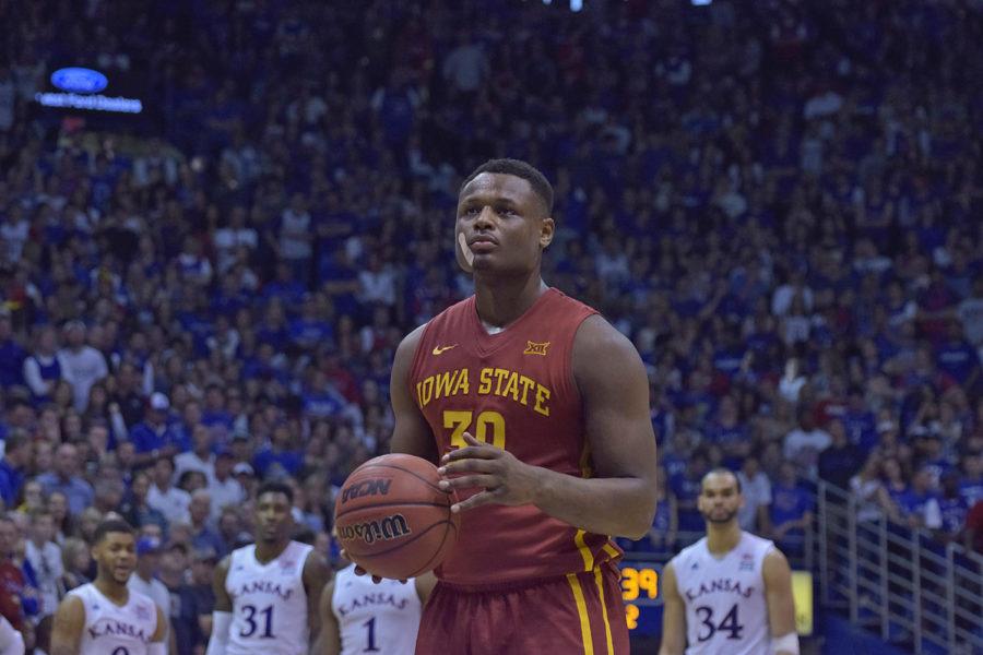 Deonte Burton shoots a free throw against Kansas after injuring his cheek on March 5, 2016 at Phog Allen Fieldhouse in Lawrence, Kansas.