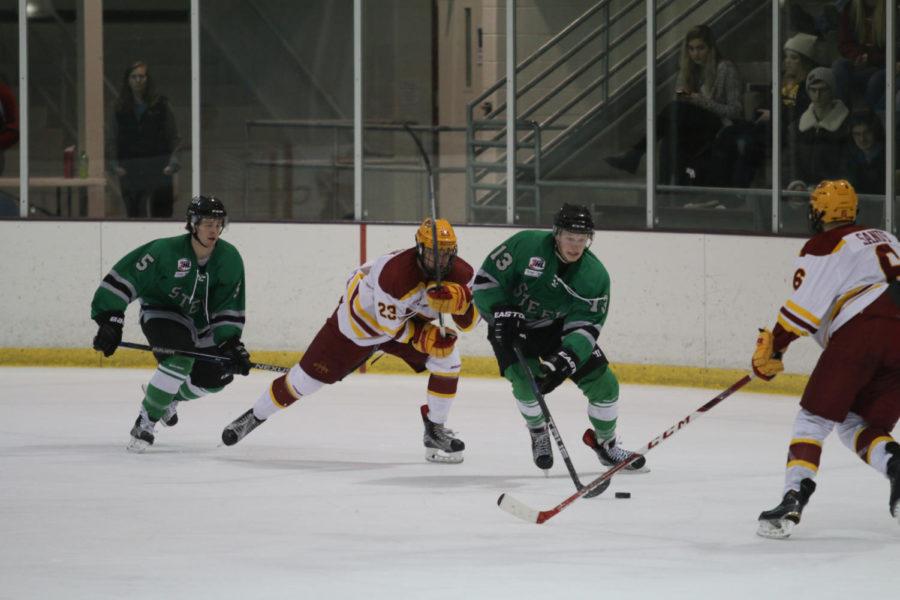 Jon Severson (23), freshman forward, chases the puck during the game against the Twin City Steel on Friday night. The Cyclones went on to beat the Steel 5-2. 