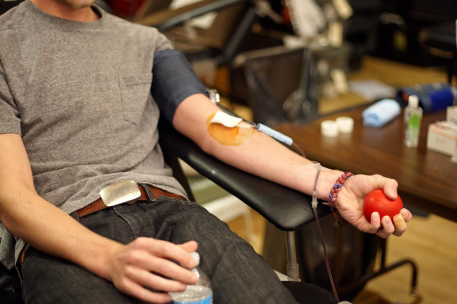 Joe Waggoner, freshman in materials engineering, donates blood at the ISU blood drive.