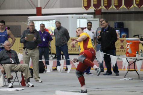 Senior Jan Jeuschede competes in the shot put finals on Big 12 Championships in Ames, Iowa on Feb. 27. Jeuschede finished in second place with a throw of 19.28 meters. 