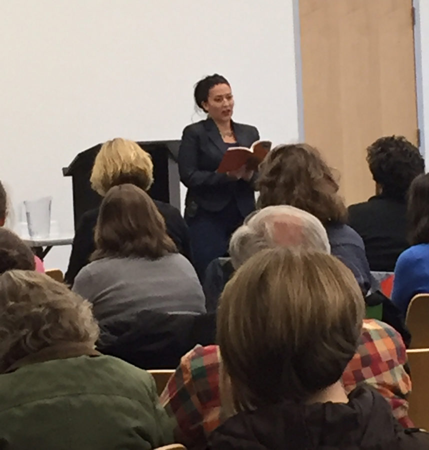 National Book Award finalist Ada Limon reads a section from her book at the Ames Public Library on March 5.  