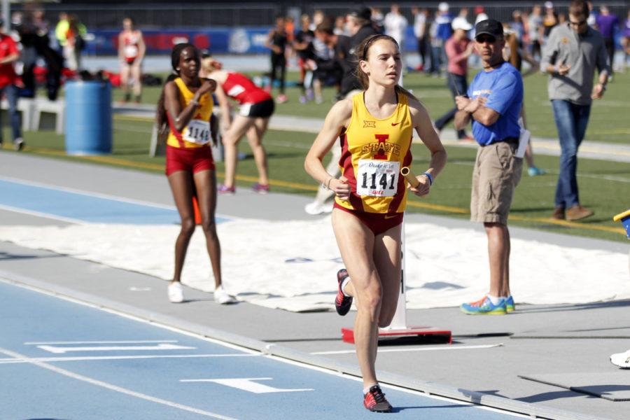Junior Evelyne Guay runs in the womens 4x1600 meter relay at the Drake Relays in Des Moines on April 23, 2015. The team finished third overall with a time of 19:23.90.