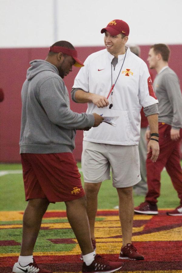 Head coach Matt Campbell smiles as he walks around the turf during spring football practice March 8 in the Bergstrom Football Complex. 