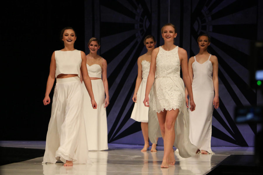 Models wearing senior Hannah Swansons Wild Flower collection walk down the runway at Stephens Auditorium April 9. The Fashion Show, which has been held annually for the past 34 years, is one of the largest student-run fashion shows in the nation. 