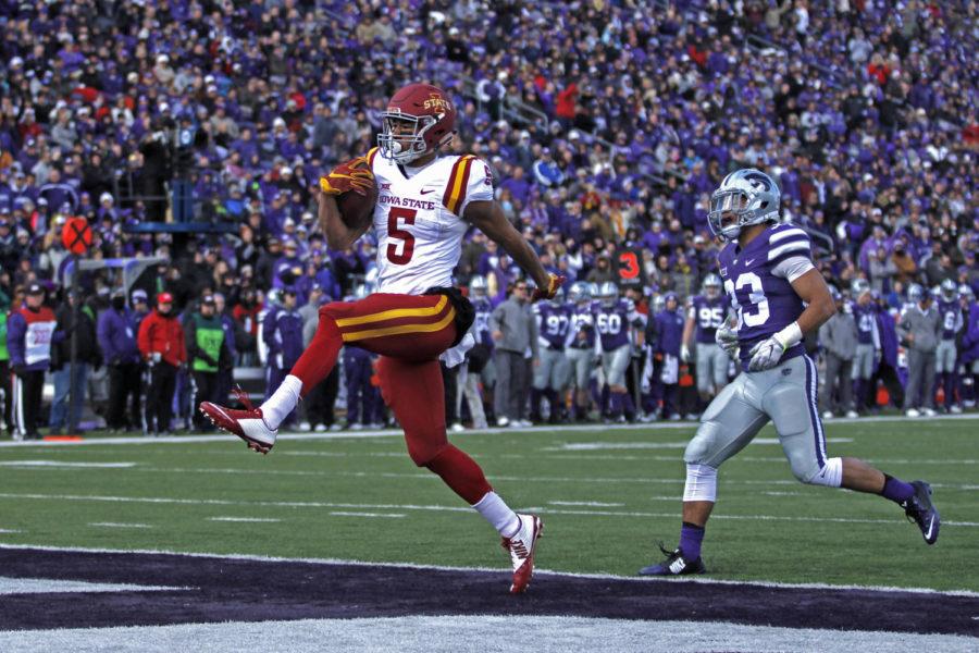 Allen Lazard high-steps into the end zone for a touchdown against Kansas State on Nov. 21 at Bill Snyder Family Stadium in Manhattan, Kan.
