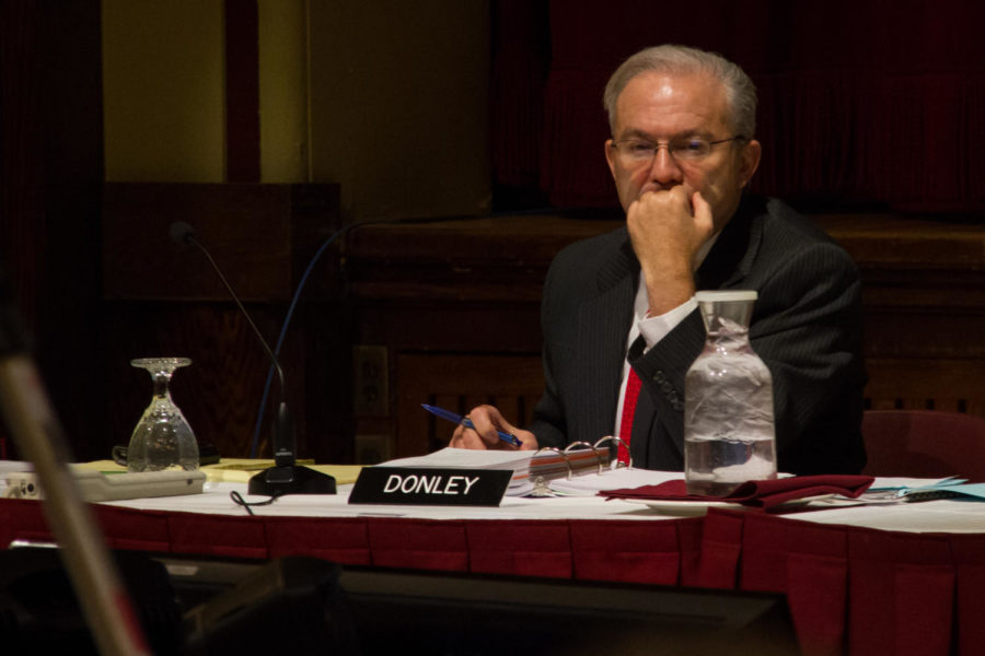 Iowa Board of Regents Executive Director and Chief Executive Officer Dr. Bob Donley listens to a result of an audit during a meeting in the Great Hall of the MU on Feb 25. 