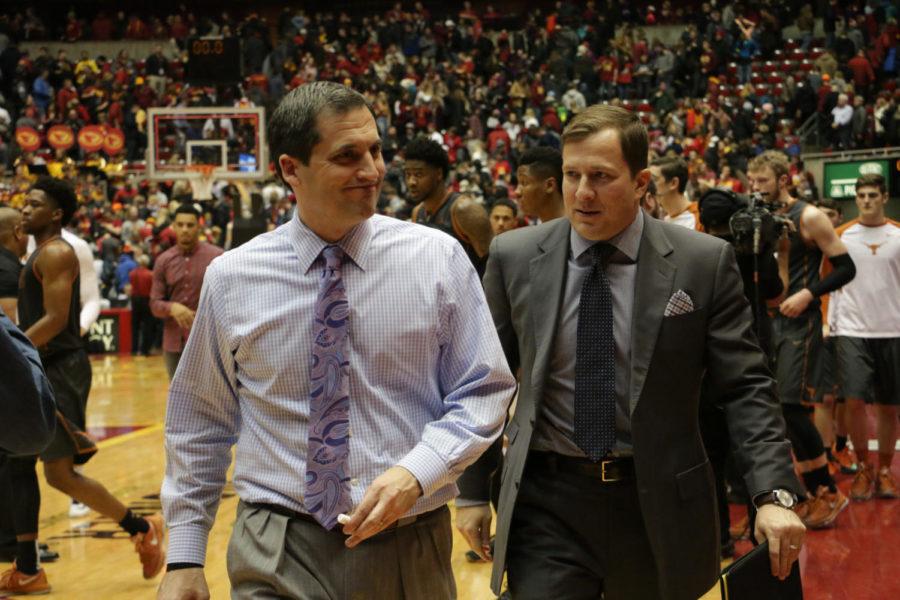 Former Iowa State Head coach Steve Prohm and former assistant coach T.J. Otzelberger walk back to the locker room after winning a game against Texas Feb. 13, 2016.