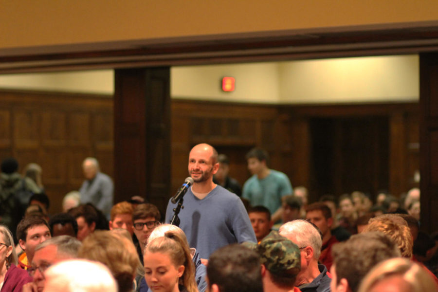 An audience member asks Low a question during the ISIS lecture's question and answer portion. This lecture took place in the Sun Room of the Memorial Union on April 6.