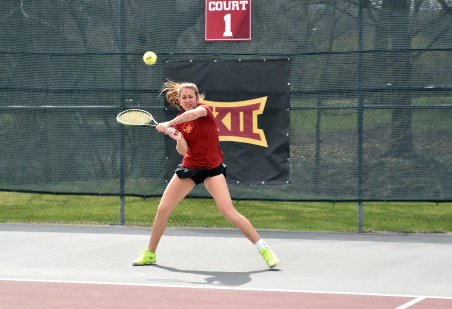 Iowa State junior Samantha Budai watches the ball in her singles match against Kansas on April 10. ISU fell 4-2. Budai scored with an 8-9 record at No. 1 singles last season.