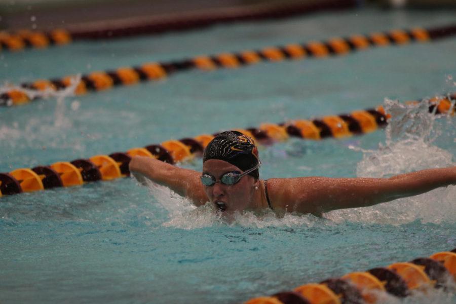 Mary Kate Luddy, sophomore, swims the 200 fly during the meet against the University of Illinois Fri. night. Luddy finished second in the event with a time of 2:05.07.