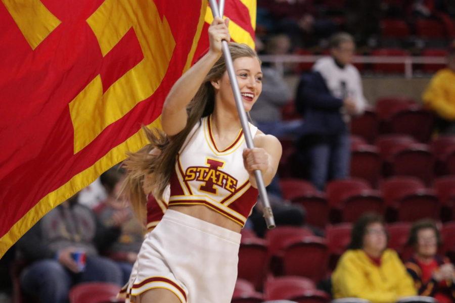 Iowa State cheerleaders parade the the floor of Hilton before the women's basketball game versus Texas Christian University on Saturday night. Both teams coming into this game had the same record versus Big 12 teams (2-7).