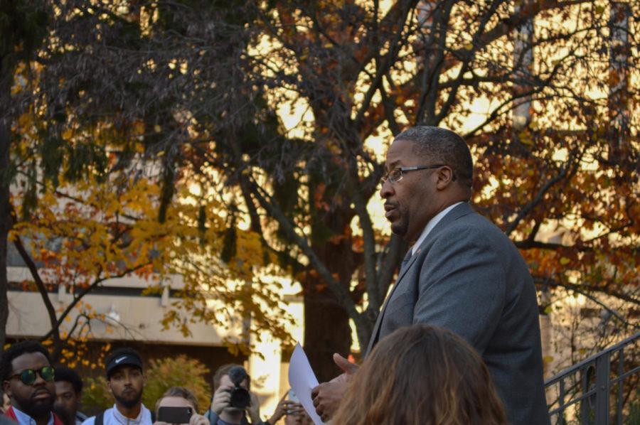Martino Harmon, Senior Vice President of student affairs, speaks to students in front of the Enrollment Services Building on Nov. 16. We have always supported undocumented students, stated Harmon. 