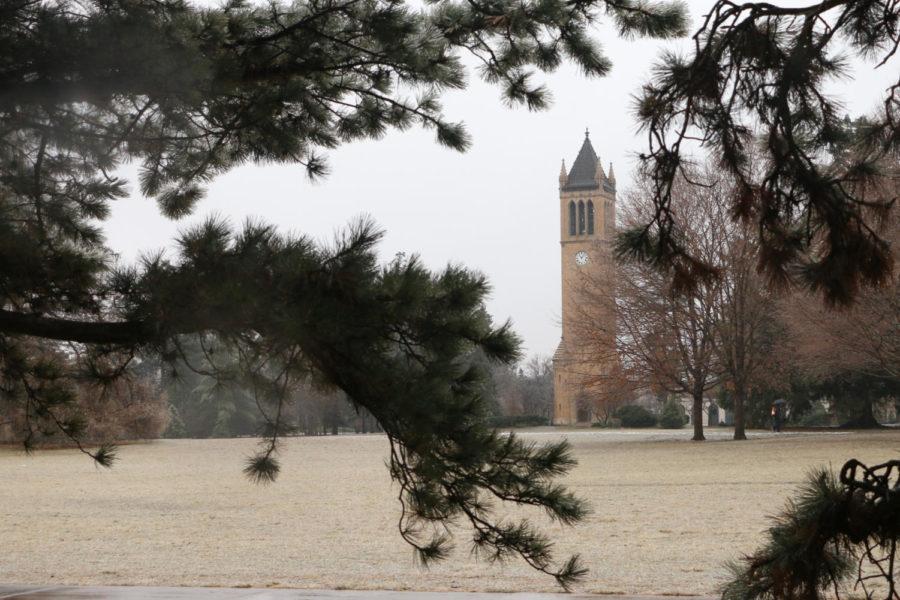 Freezing rain falls on Central Campus Jan. 16, covering the sidewalks and grass with ice. 