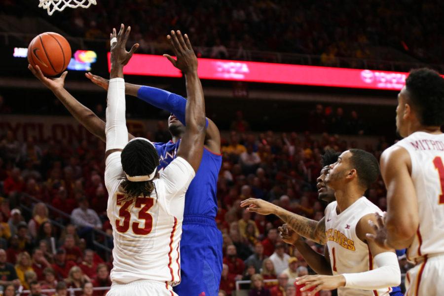 Iowa State freshman Solomon Young (33) defends the hoop during their game against Kansas Jan. 16 at Hilton Coliseum. The No. 2 Jayhawks defeated the Cyclones 76-72.