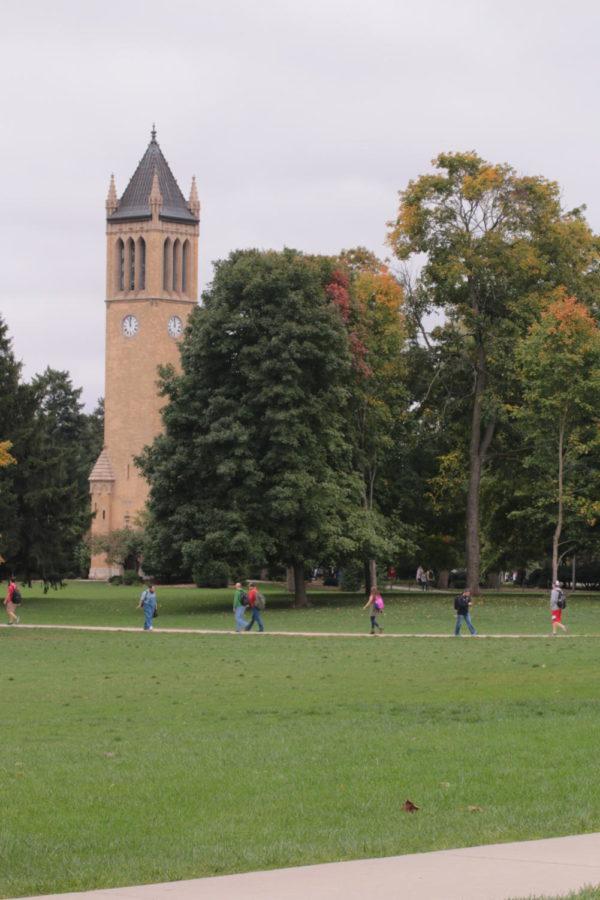 Iowa State students transition from classes in front of the Campanile