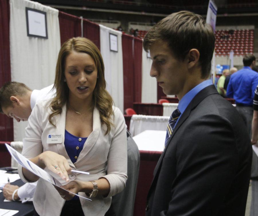 Claire Breese of the Mass Mutual Financial Group speaks with pre-business major Daniel Breitbarth during the Business, Industry and Technology career fair on Wednesday, Sept. 25. 