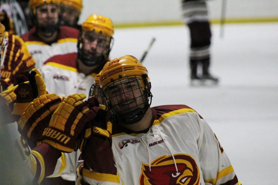 Sophomore defenseman Jake Arroyo celebrates his goal against Robert Morris. Arroyo scored a power play goal during the third period. The Cyclones won the game 3-1.