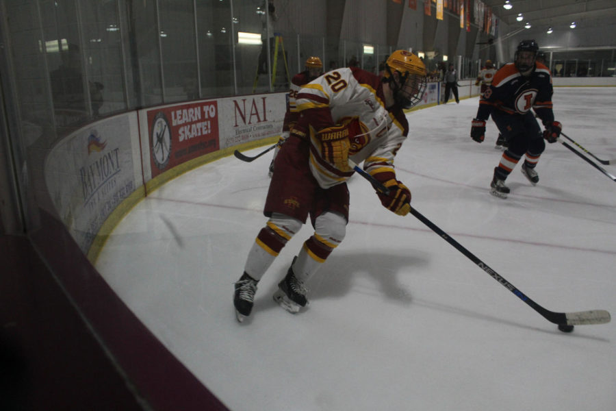 Senior forward Chase Rey skates with the puck on Jan. 13. The Cyclones lost against Illini Hockey.