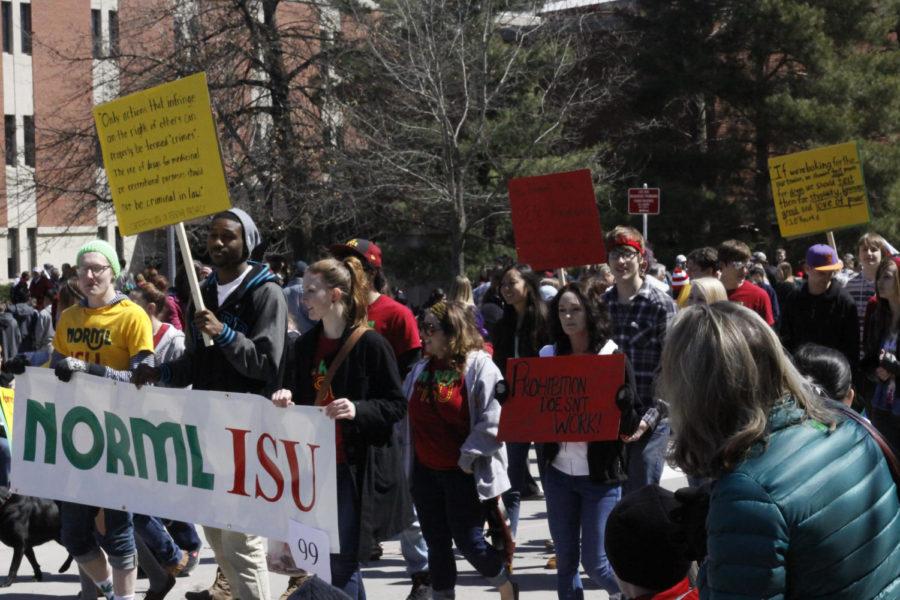 Students of the ISU Chapter of the National Organization for the Reform of Marijuana Laws march at the Veishea parade on April 20, 2013.
