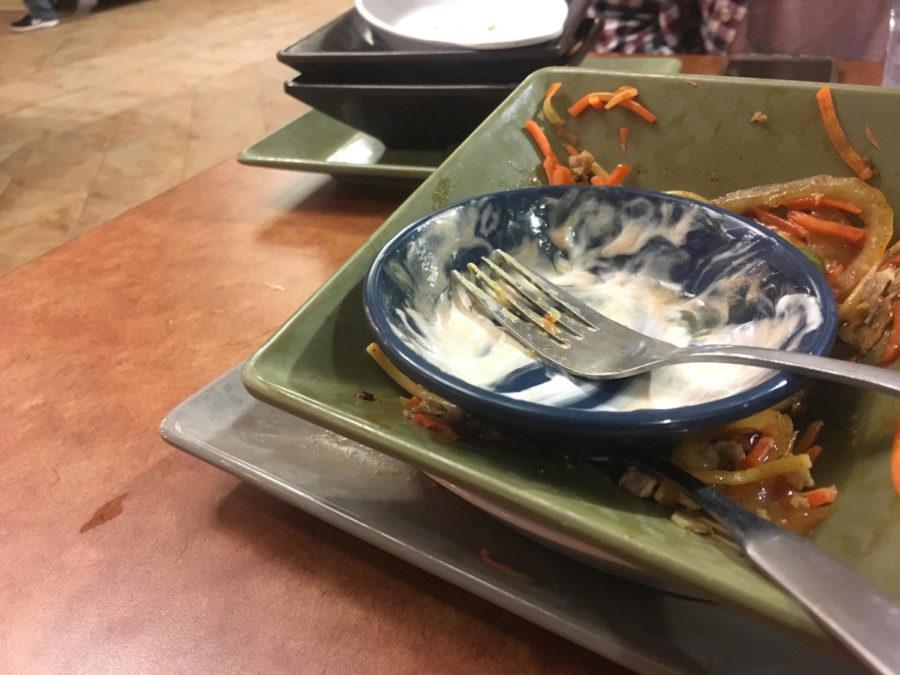 ISU Dining has gone away from using trays to carry food and instead has changed conveyer belts to transport the dirty dishes. 