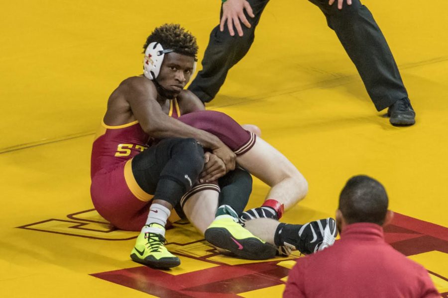 Iowa State 125-pound wrestler Markus Simmons works for a turn at the Harold Nichols Cyclone Open on Nov. 13.