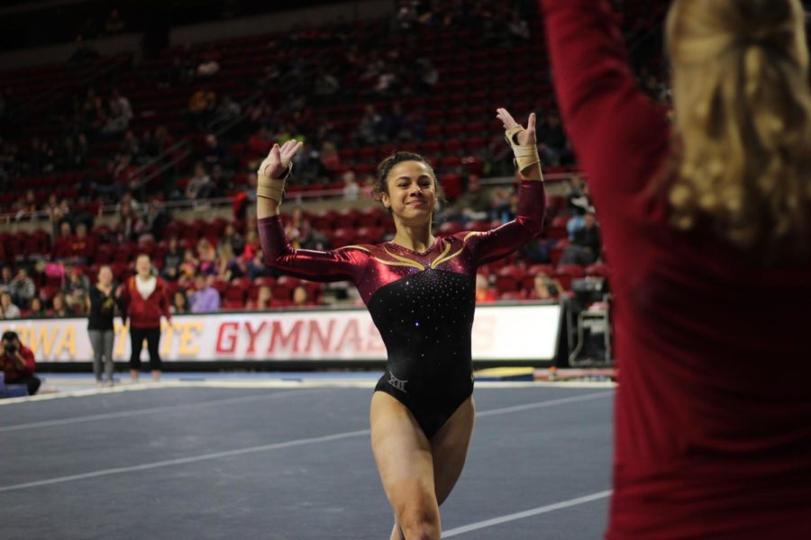 Junior Hilary Green finishes her tumbling pass on Jan. 13 in Hilton Coliseum during Iowa State gymnastics tri-meet on Jan. 13. Iowa State won the tri-meet against Towson and UW-Oskosh with a score of 194.275.