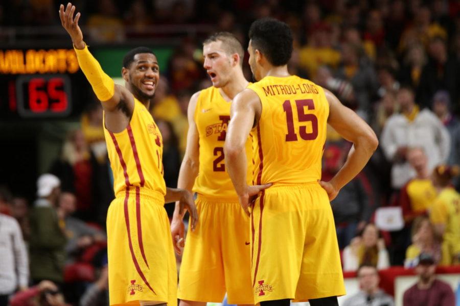 Iowa State guards Monte Morris, Matt Thomas and Naz Mitrou-Long talk during a break in the game against Kansas State. The three would combine for 50 of Iowa States 70 points in the win.