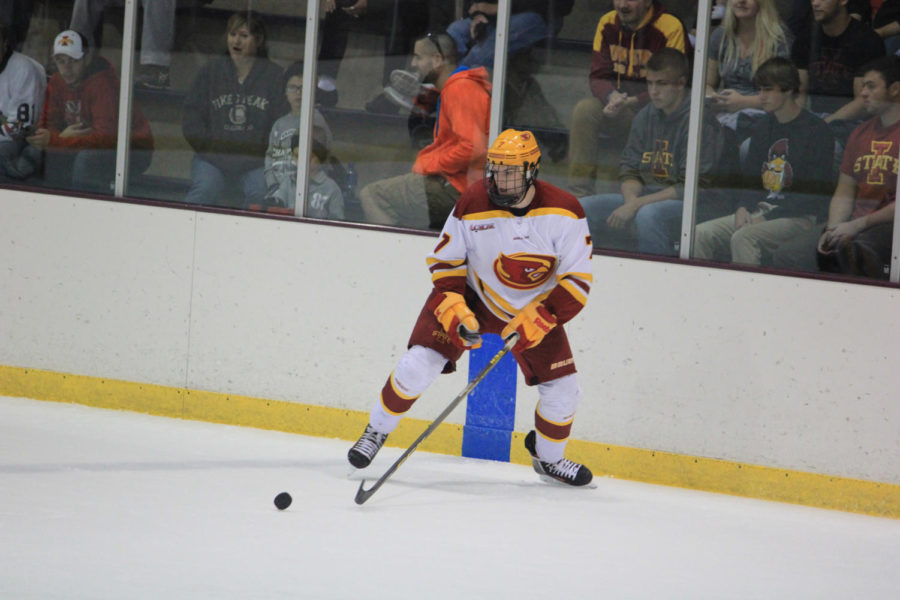 Freshman forward Tony Uglem takes the puck during the game against the Ohio Bobcats at the Ames/ISU Arena on Saturday. Anytime that Uglem, Aaron Azevedo and Colton Kramer are on the ice, good results appear in the end.