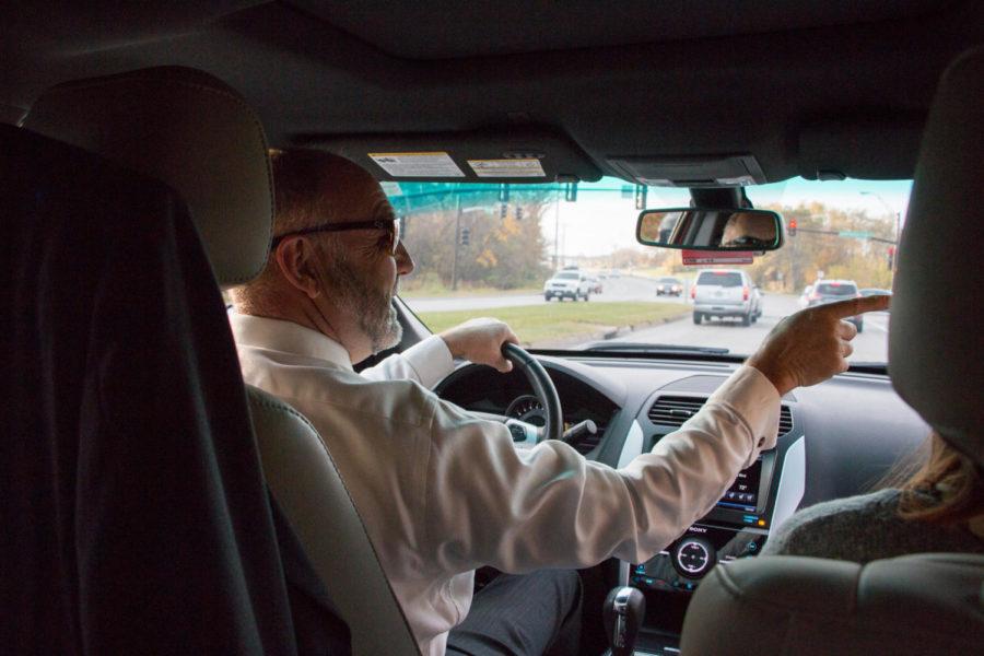 ISU President Steven Leath points at Reiman Gardens on his way to the Core Facility at the Research Park Nov. 7. 