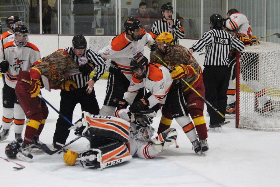 The Cyclones and Jamestown players break out into a fight in front of the Jamestown goal Jan. 20.