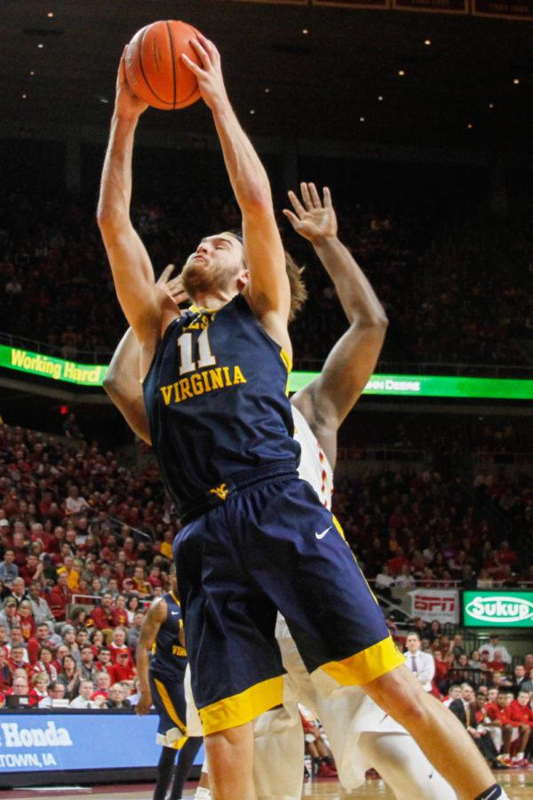 West Virginia senior Nathan Adrian jumps up for a layup during a game Jan. 31 in Hilton Coliseum. After trailing early, the Cyclones lost 85-72, and move on to 13-8 on the season, and 5-4 in conference play. 