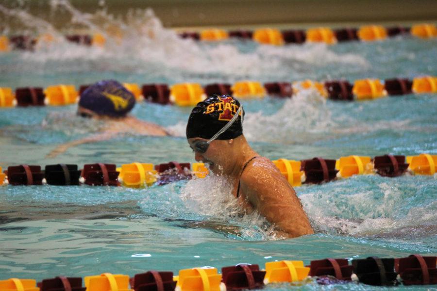 Iowa State junior Megan Childs swims the backstroke in the 200-yard medley relay during the meet against Northern Iowa on Jan. 28 at Beyer Hall. Childs' relay finished third with a time of 1:49.46.