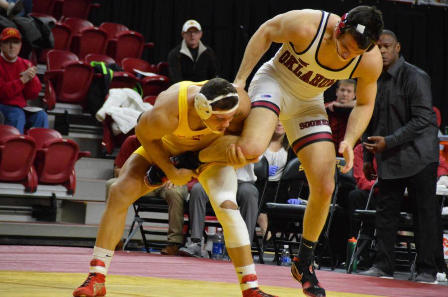 Redshirt+sophomore+Marcus+Harrington+wrestles+opponent+Brad+Johnson+during+the+Beauty+and+the+Beast+event+at+Hilton+Coliseum+on+Jan.+27.%C2%A0