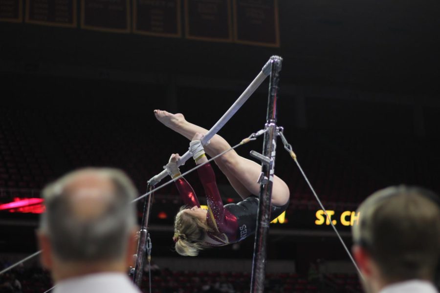 Laura+Burns+performs+her+bars+routine%C2%A0on+Jan.+13+in+Hilton+Coliseum%C2%A0during+Iowa+State+gymnastics+tri-meet+on+Jan.+13.%C2%A0Iowa+State+won+the+tri-meet+against+Towson+and+UW-Oskosh+with+a+score+of+194.275.