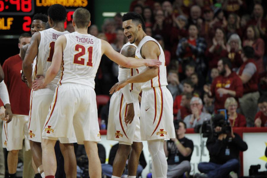 Iowa State senior Naz Mitrou-Long is excited during a timeout after a made shot by his teammate against Texas. The Cyclones would go on to win, 79-70.