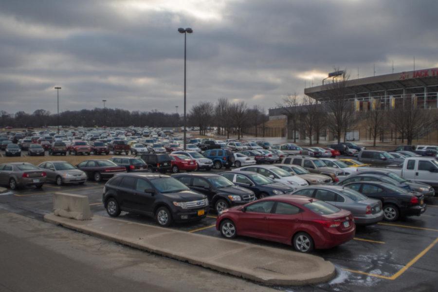 Students cars are parked in the parking lot of Jack Trice Stadium on Jan. 10. When Jack Trice Stadium is not hosting events, students who purchase permits are allowed to park their cars in the stadiums parking lot.