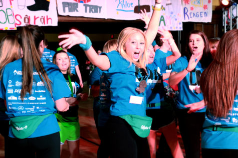 Sorority members of Alpha Chi Omega dance as a team at the Iowa State Dance Marathon. Students at Iowa State began dancing at 7:00 p.m. on Jan. 22 and danced through the night until 7:00 a.m. the next morning. The marathon was held to help raise money for the University of Iowa Childrens Hospital.