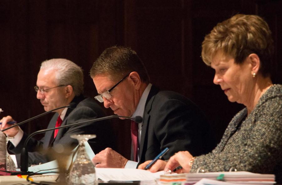 Board of Regents President Bruce Rastetter looks over notes during a meeting in the Memorial Union Feb. 25. 