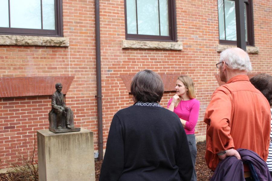 Gebhart guides the tour outside to another Christian Peterson sculpture of Lincoln sitting with a book in his hand. This was the last piece she shown.