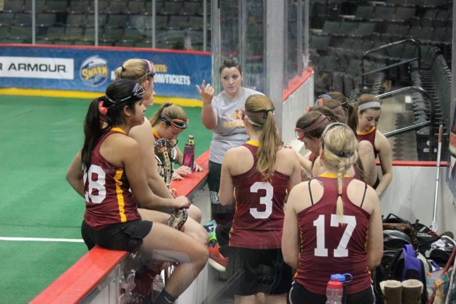 The Iowa State Lacrosse Club lost its coach, Courtney French (back in the grey shirt), in December. Now the team will attempt to make its third straight nationals appearance. 