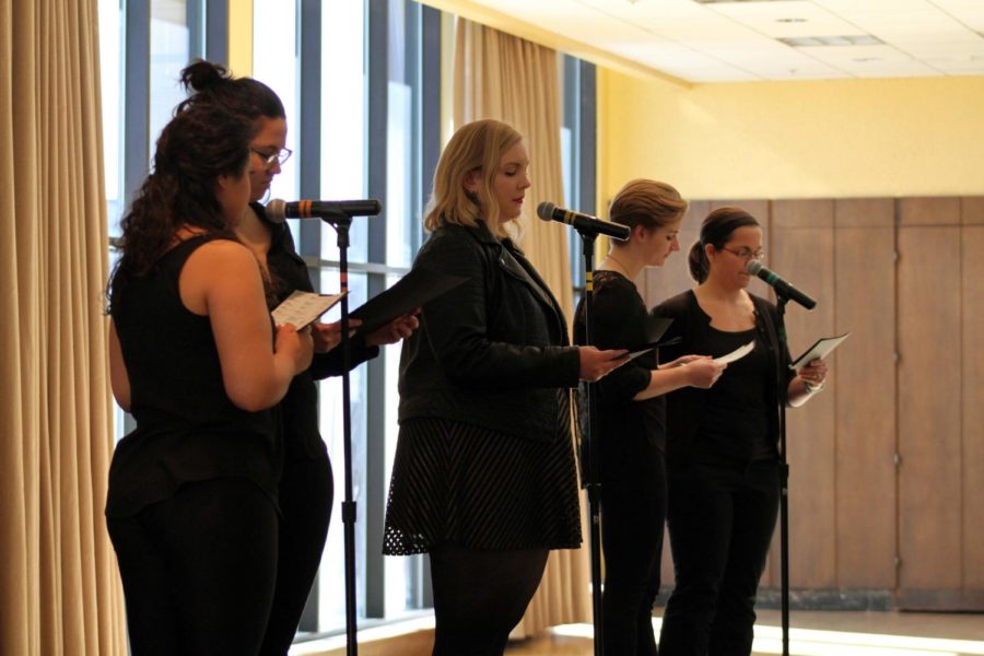 Performers talk about the experience of transgender women during the Vagina monologues in the Sun Room of the Memorial Union on Feb. 12.