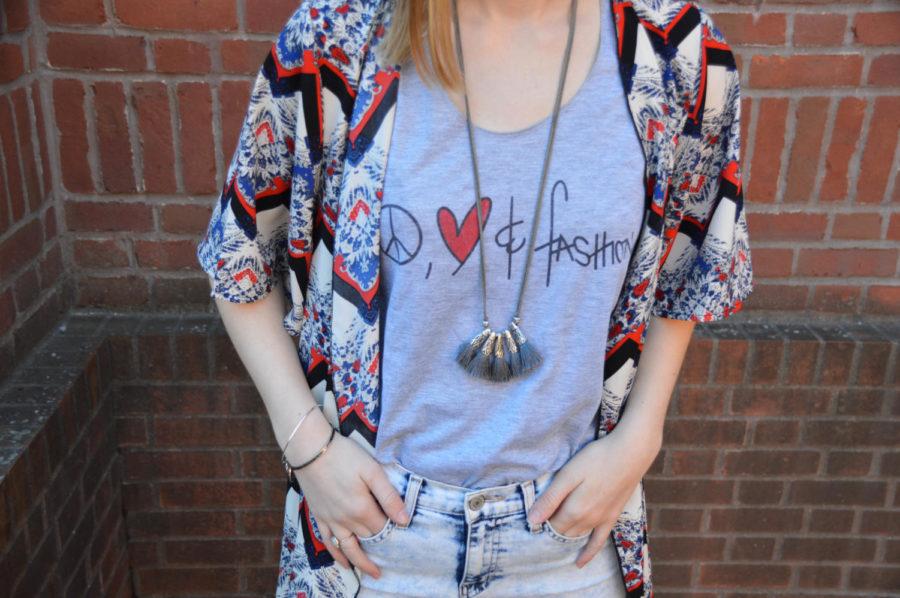I love graphic tees. Not only are they fun and multi-purposeful, but they also are expressive. My tee says with symbols, Peace, love & fashion.