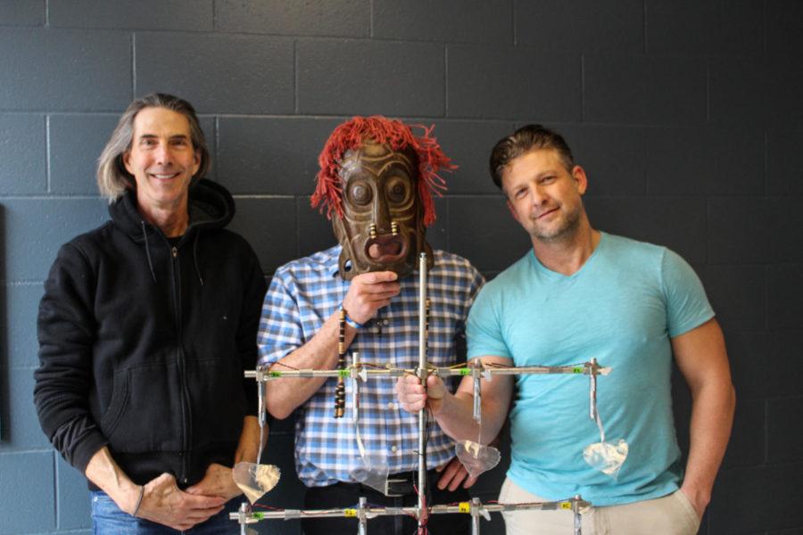 Dr. Eric Henderson (left), Dr. Michael McCloskey (middle), and Dr. Curtis Mosher (right) finish their piezoelectric, electricity generating, cottonwood tree prototype.  